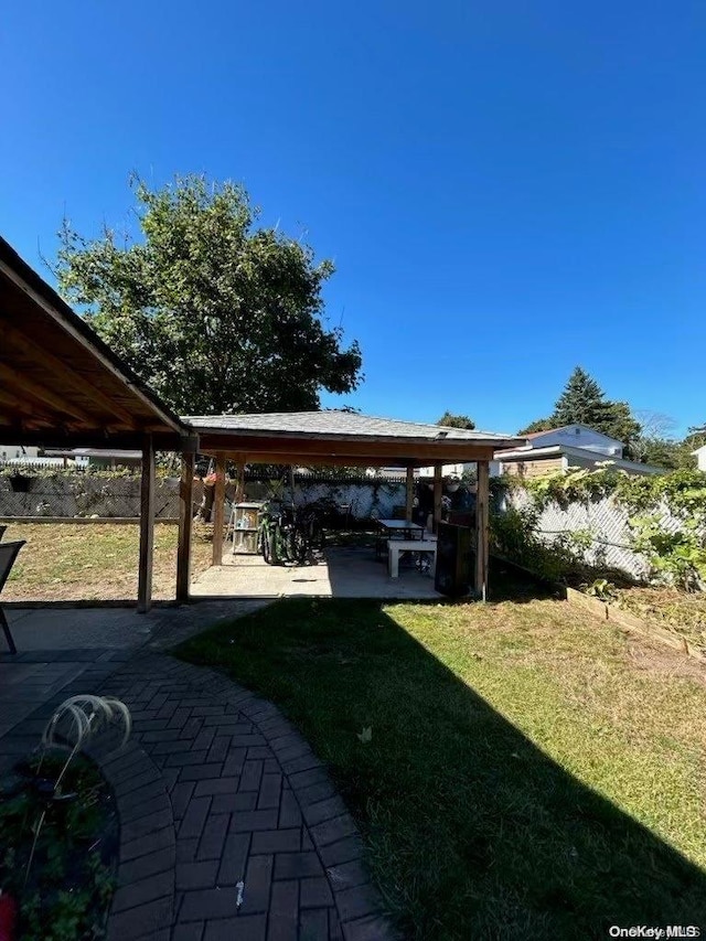 view of yard with a patio area