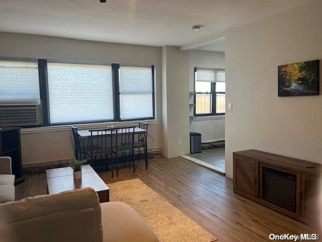 living room with hardwood / wood-style floors