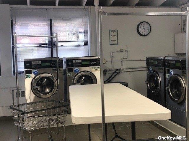 laundry area featuring washing machine and dryer