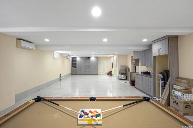 rec room with a wall mounted air conditioner and pool table