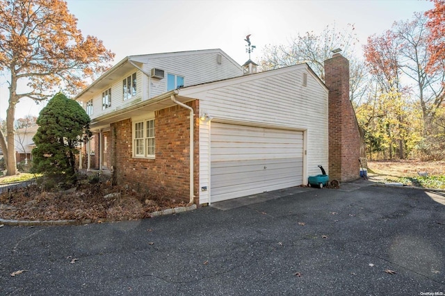 view of home's exterior featuring a garage