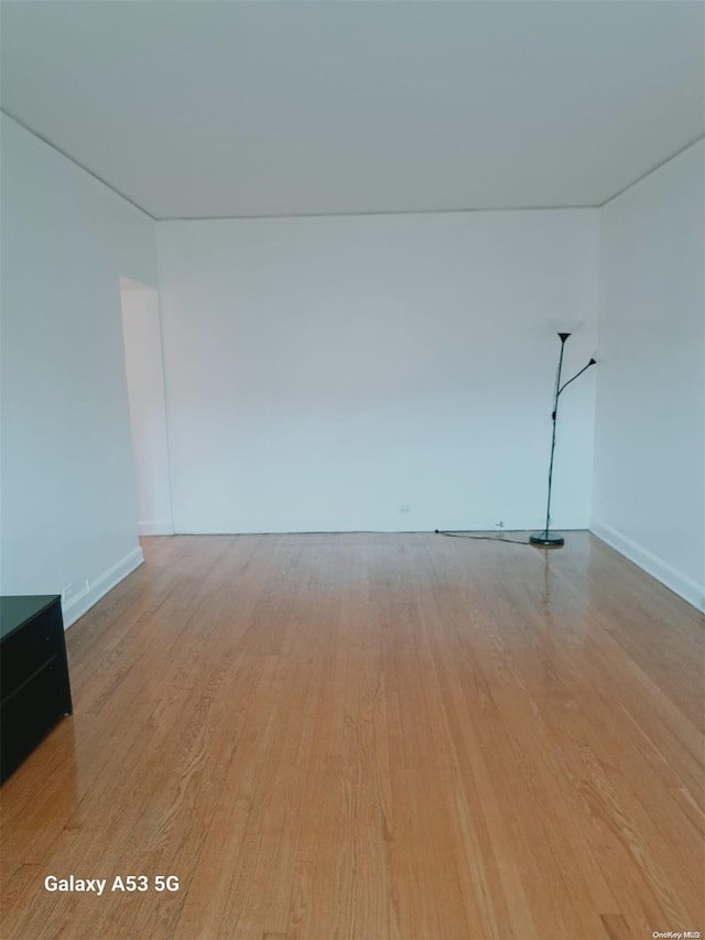 spare room featuring light hardwood / wood-style floors