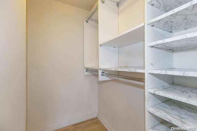 spacious closet with light wood-type flooring