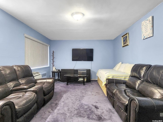 carpeted living room with a wall unit AC