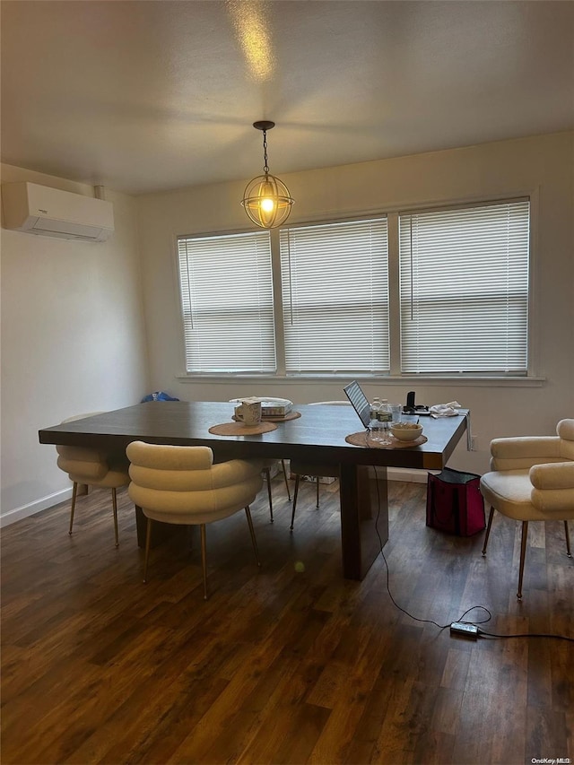 dining area with dark hardwood / wood-style floors and a wall mounted AC