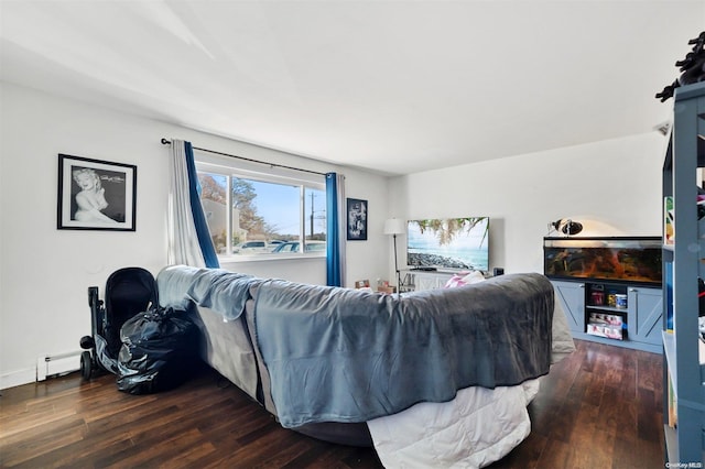 living room featuring baseboard heating and dark wood-type flooring