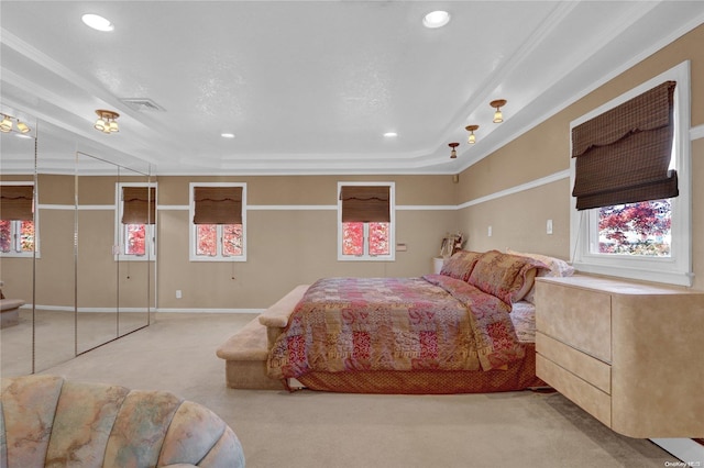 bedroom featuring crown molding and carpet