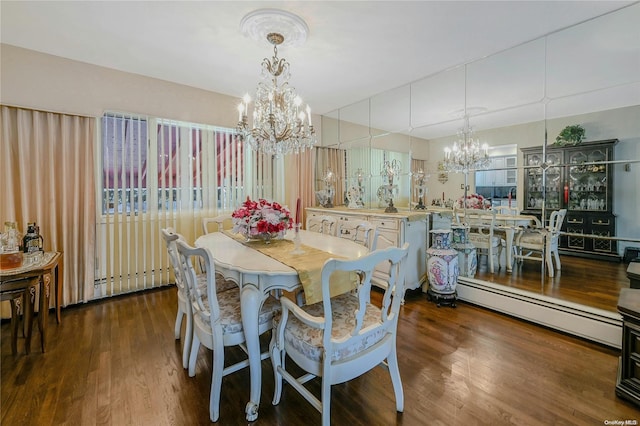 dining space with a notable chandelier, dark hardwood / wood-style floors, and a baseboard heating unit