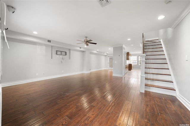 unfurnished living room with ceiling fan, dark hardwood / wood-style flooring, and crown molding