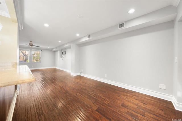 unfurnished living room with ceiling fan and hardwood / wood-style floors