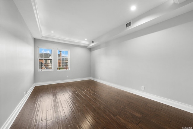 unfurnished room with hardwood / wood-style flooring