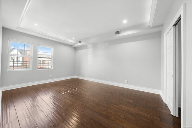 unfurnished room featuring dark wood-type flooring