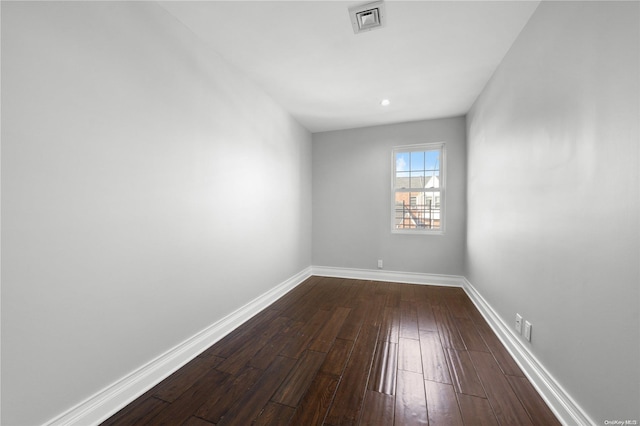 empty room with wood-type flooring