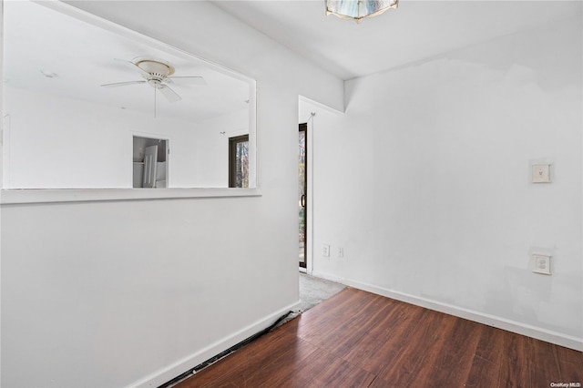 empty room featuring wood-type flooring and ceiling fan