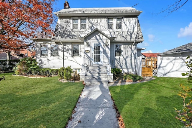 view of front of home with a front lawn