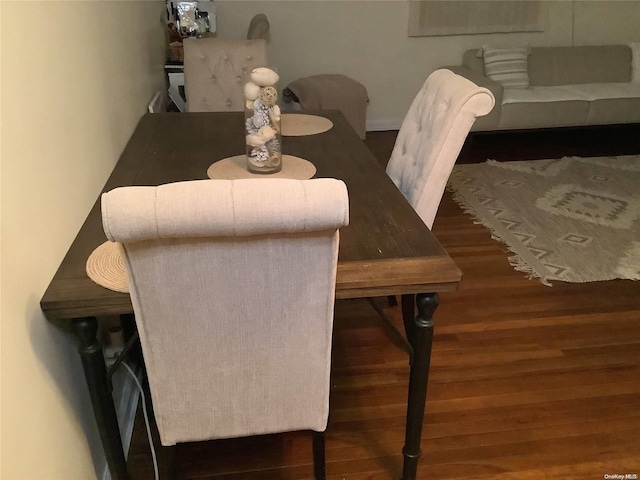 dining room featuring dark hardwood / wood-style flooring