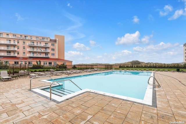 view of pool with a patio