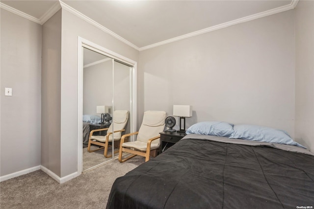 bedroom featuring crown molding, a closet, and carpet floors