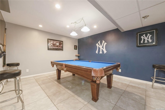 playroom with light tile patterned flooring, a drop ceiling, and billiards