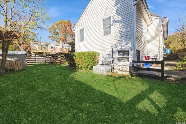 back of property with a lawn