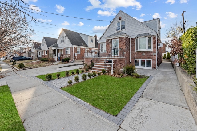 bungalow with a front yard