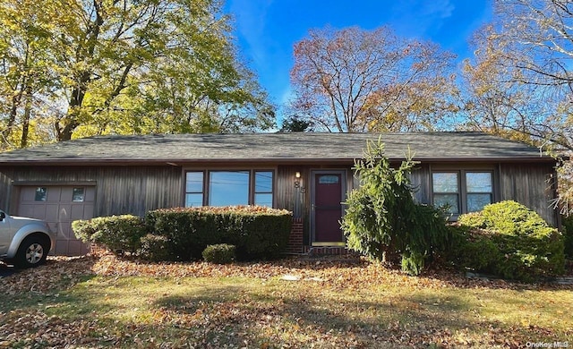 single story home with a garage