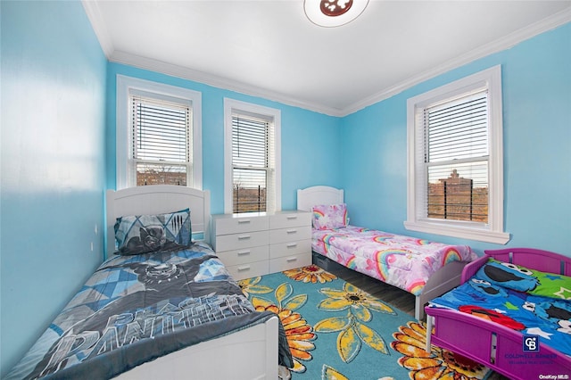 bedroom with ornamental molding