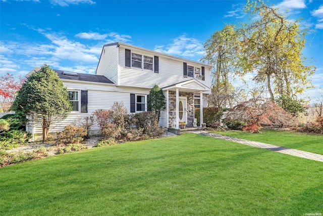 view of front of home with a front yard