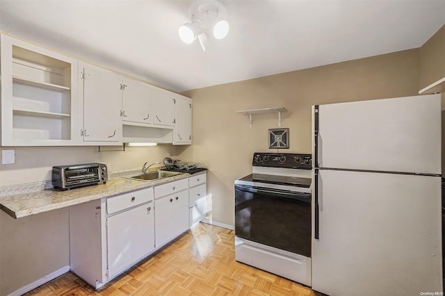 kitchen featuring sink, white refrigerator, white cabinets, electric range, and light parquet floors