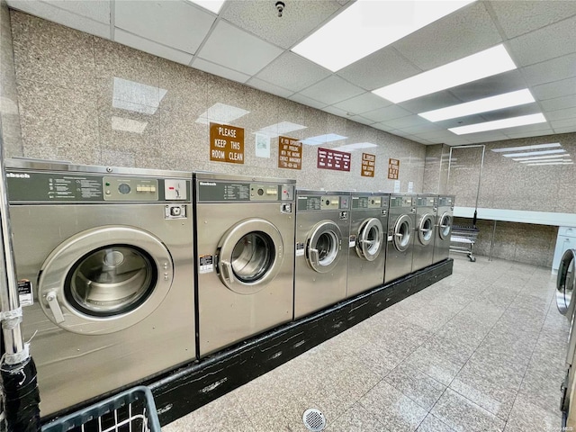 washroom featuring washing machine and clothes dryer