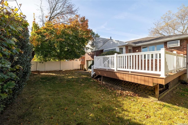 view of yard with a wooden deck