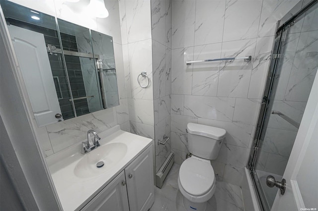 bathroom with an enclosed shower, vanity, baseboard heating, tile walls, and toilet