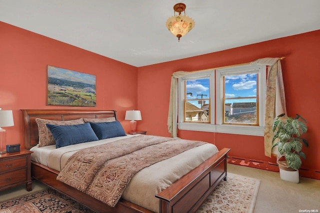 bedroom with light colored carpet