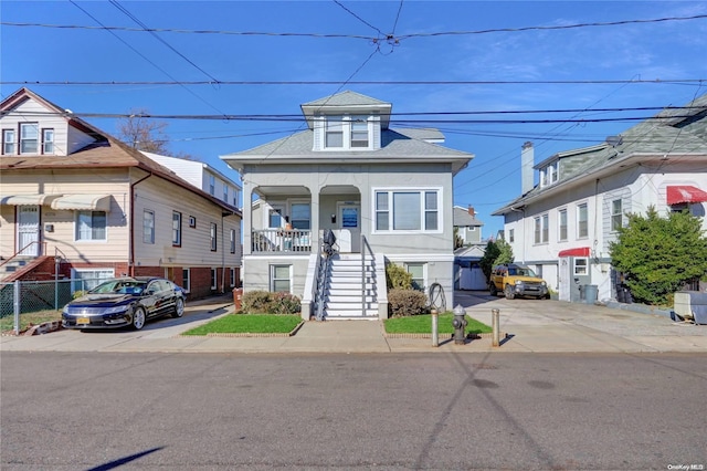 multi unit property featuring a porch