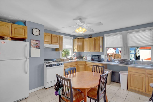 kitchen featuring ceiling fan, light brown cabinets, white appliances, and light tile patterned floors