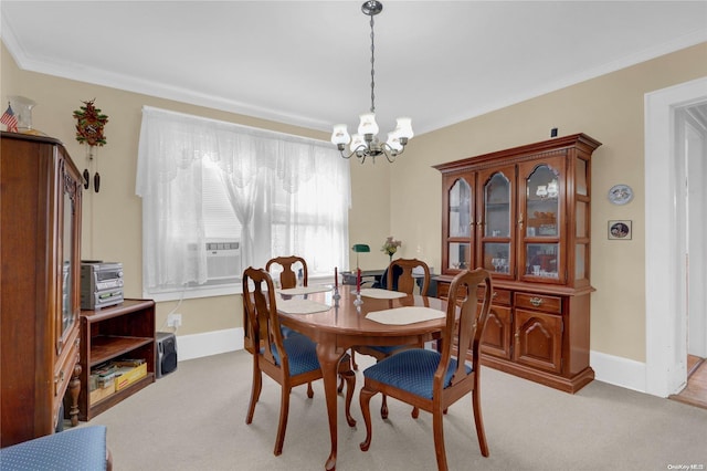 carpeted dining space featuring crown molding, cooling unit, and an inviting chandelier