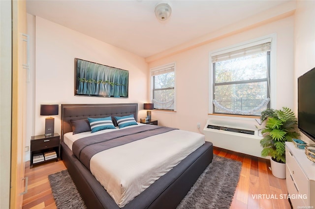 bedroom featuring hardwood / wood-style floors