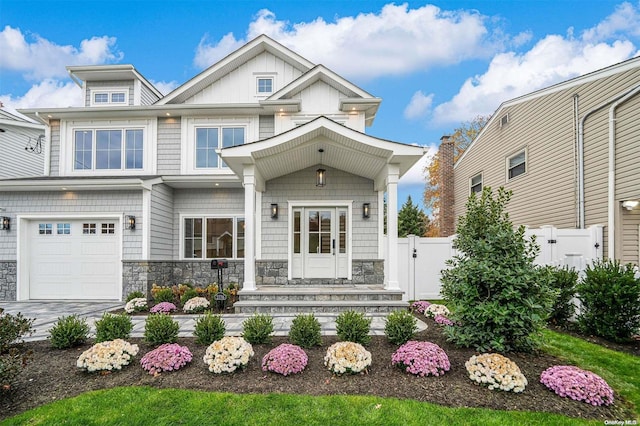 craftsman-style home with a garage