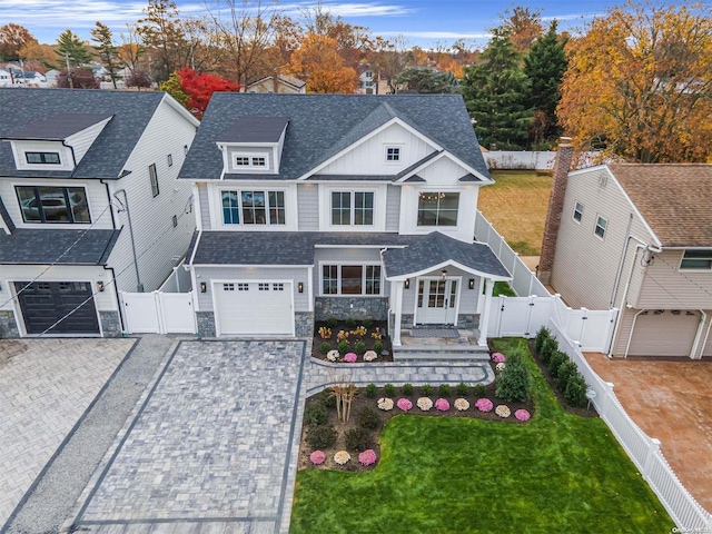 view of front of property with a front lawn