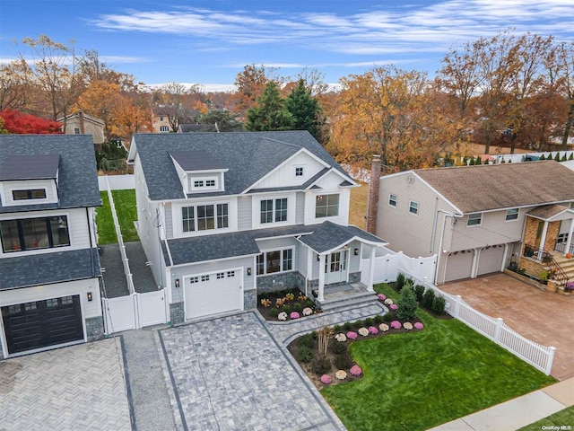 view of front of property with a front lawn