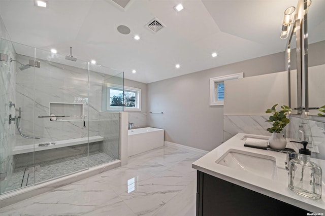 bathroom featuring vanity and plus walk in shower