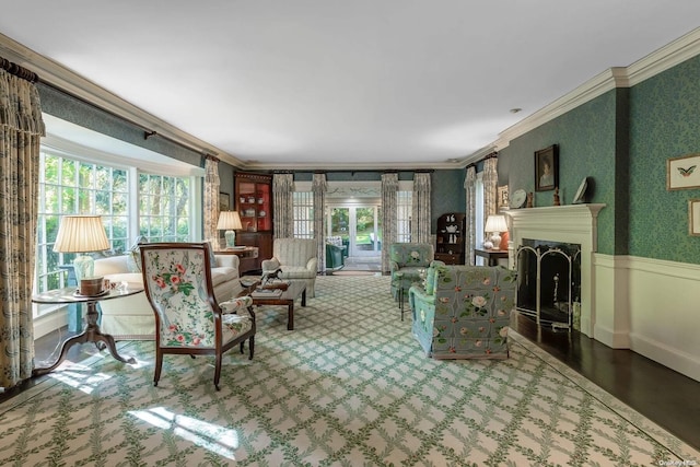 living room with plenty of natural light and crown molding