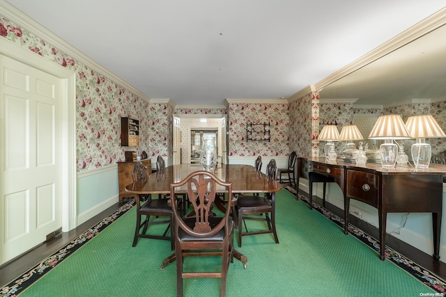 dining area featuring crown molding