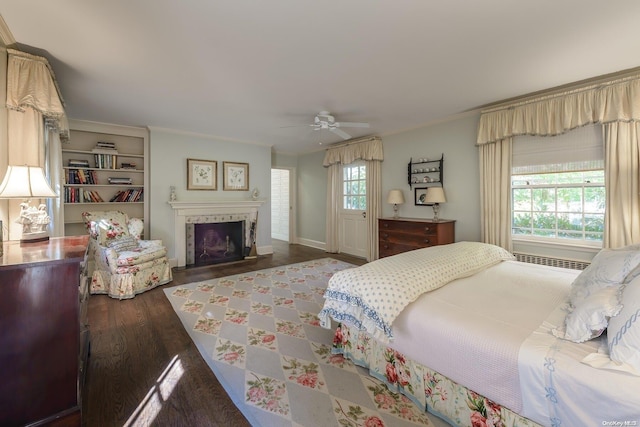 bedroom featuring ceiling fan and dark hardwood / wood-style flooring