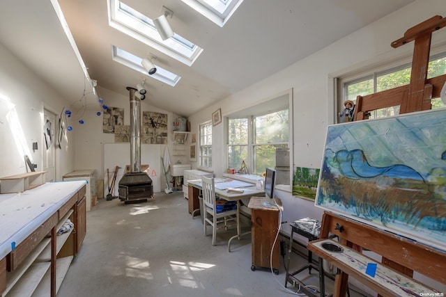 interior space with lofted ceiling with skylight