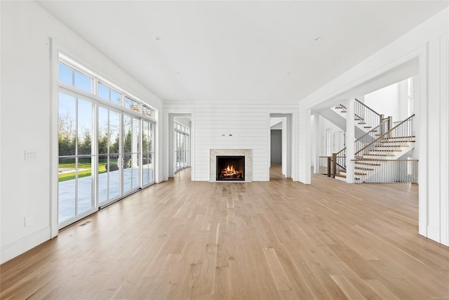 unfurnished living room with light wood-type flooring