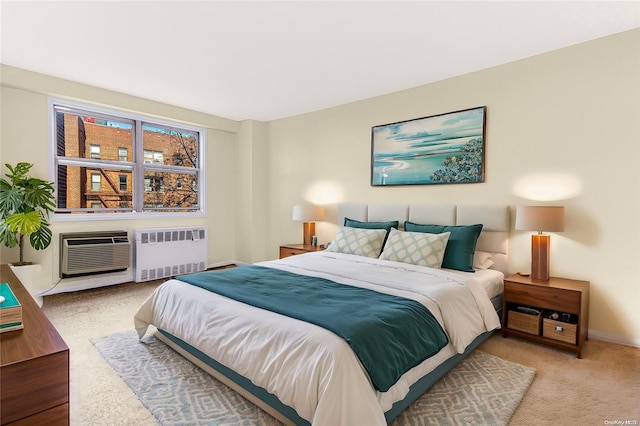 carpeted bedroom with an AC wall unit and radiator