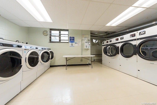 laundry room featuring separate washer and dryer