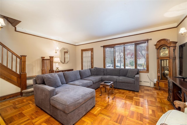 living room featuring parquet floors, baseboard heating, and ornamental molding