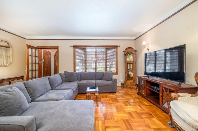 living room featuring crown molding and light parquet floors